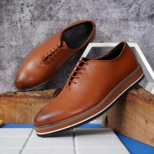 Tan lace up shoes